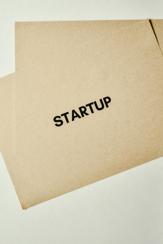 Brown paper envelope with the word 'STARTUP' symbolizing entrepreneurship and innovation.